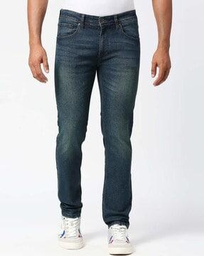 men vapour lightly wash slim fit tapered leg jeans