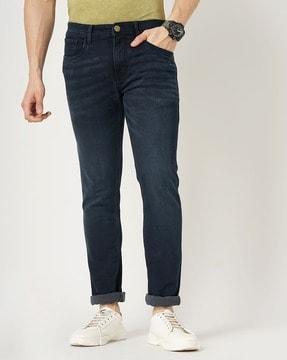 men washed skinny jeans