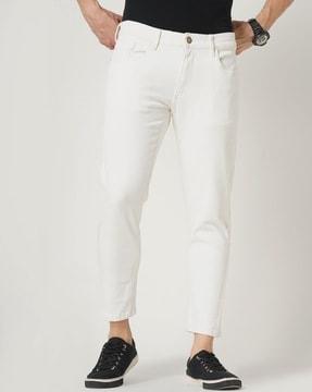 men washed tapered jeans