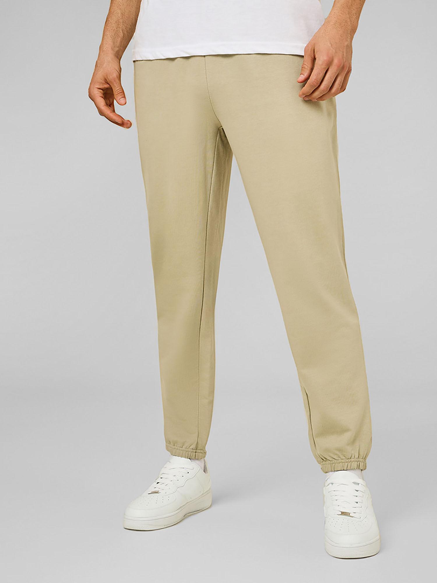 mens beige cotton relaxed fit french terry joggers with elasticated hem