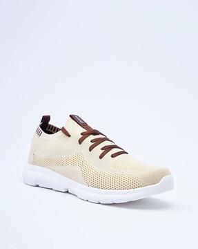 meshed lace-up running shoes