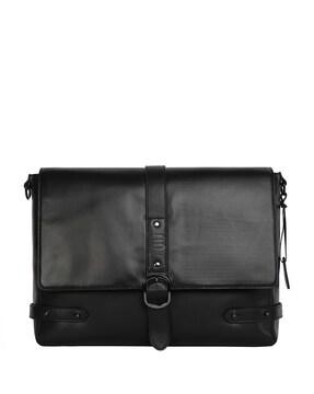 messenger bag with button closure