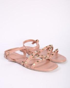 metal embellished sandals with buckle closure