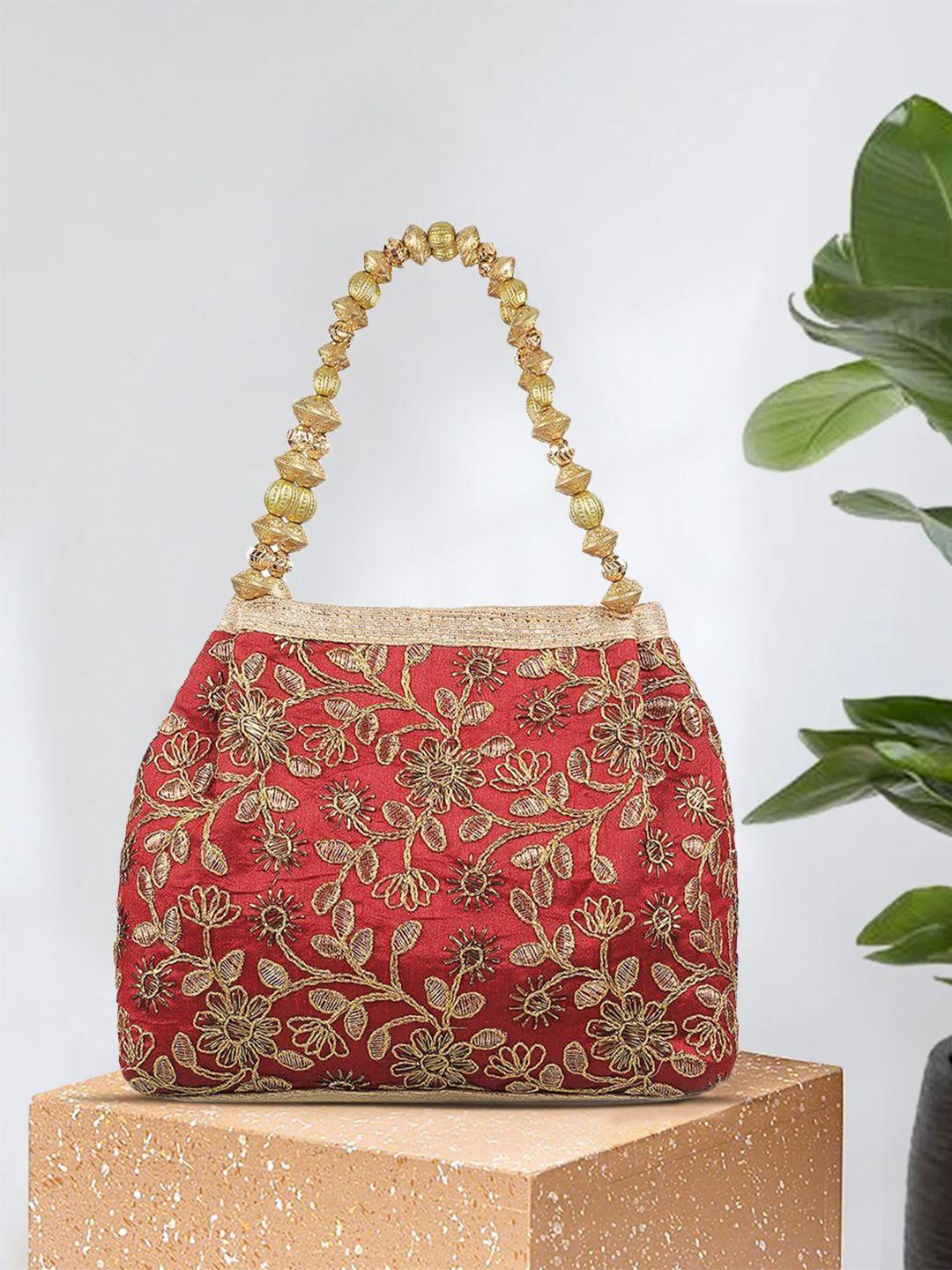 metro women maroon ethnic motifs embroidered handheld bag