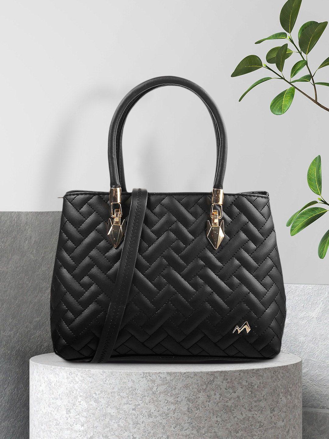 metro black quilted structured handheld bag