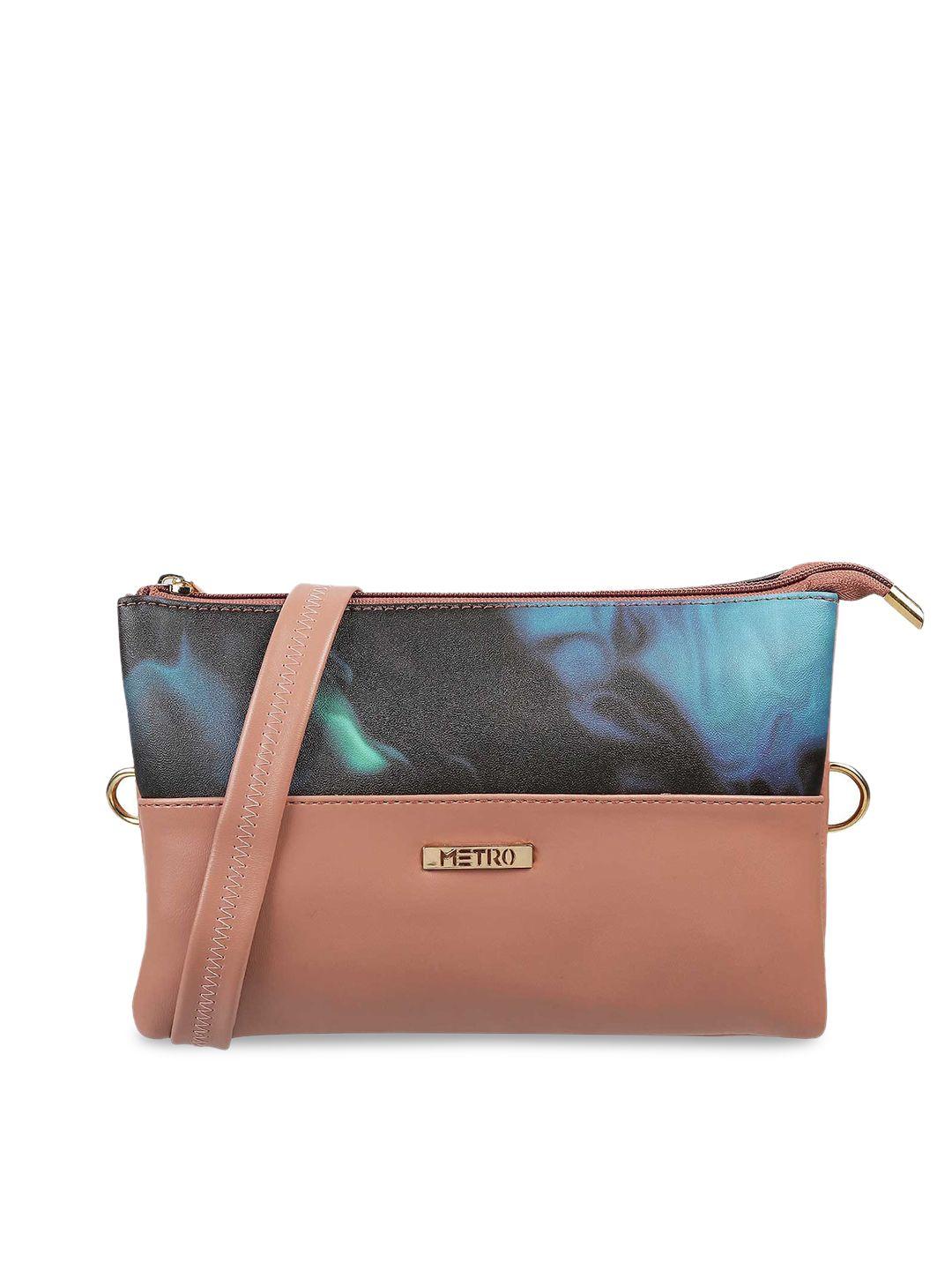metro peach-coloured colourblocked swagger shoulder bag with tasselled