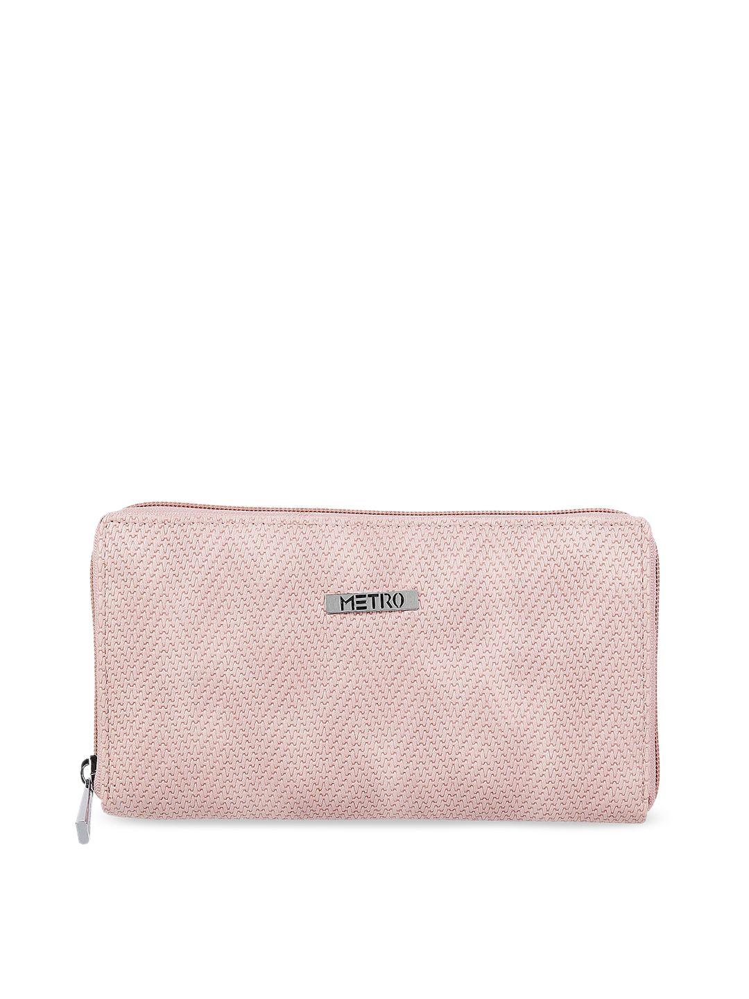 metro peach-coloured textured purse clutch