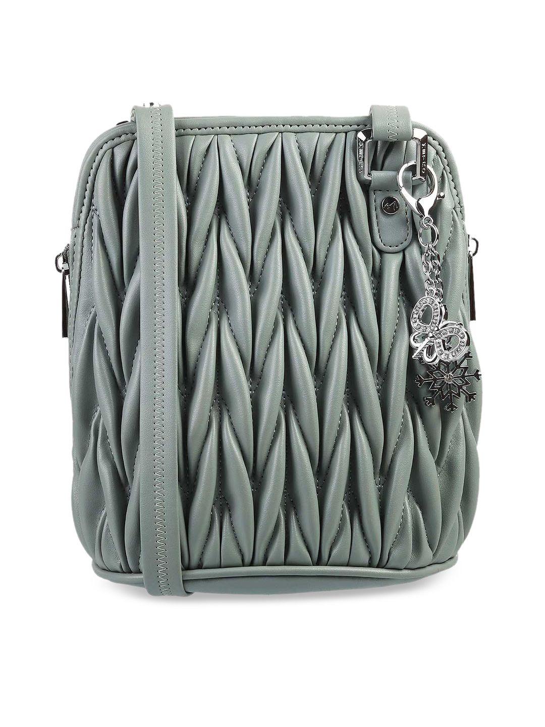 metro women green structured sling bag with quilted