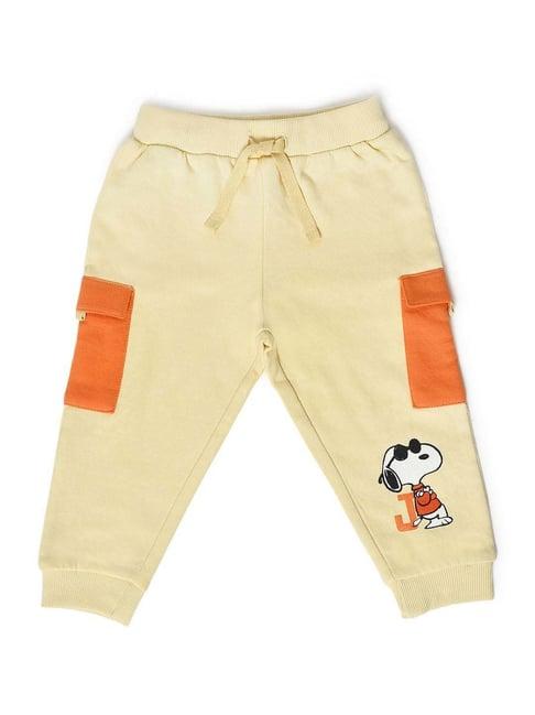 miarcus kids cream & orange cotton printed joggers