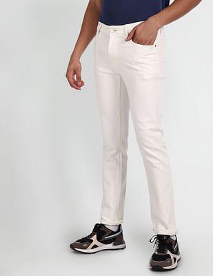 michael slim tapered mid rise jeans