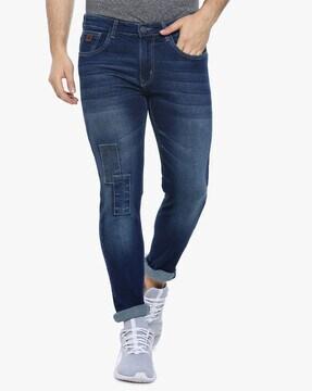 mid rise jeans with applique detail