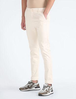 mid rise slim tapered fit trousers