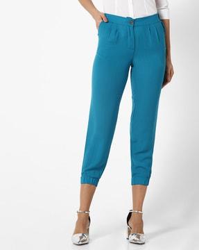 mid-calf length pleated trousers with insert pockets