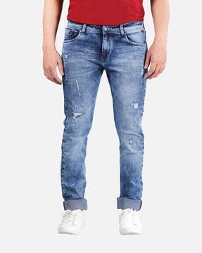 mid distress skinny fit jeans