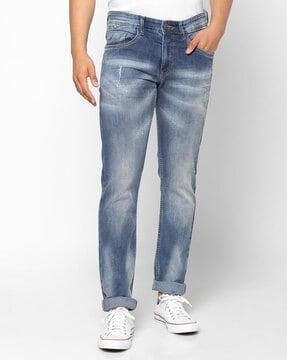 mid distressed skinny jeans