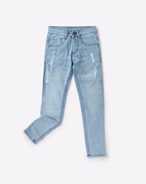 mid-rise distressed jeans