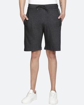 mid-rise flat front shorts