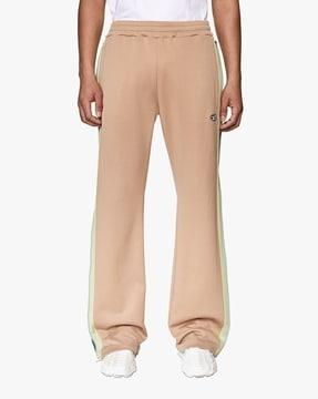 mid-rise flat-front pants with zipper pockets
