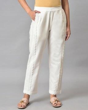 mid-rise pants with lace inserts