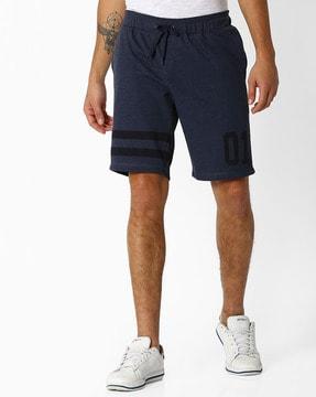 mid-rise printed bermudas with insert pockets