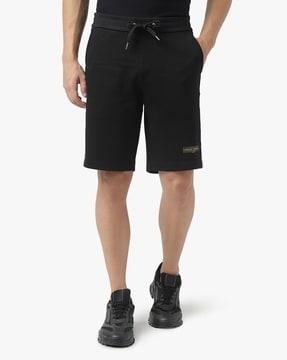 mid-rise shorts with hd logo print