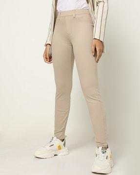 mid-rise skinny fit trousers