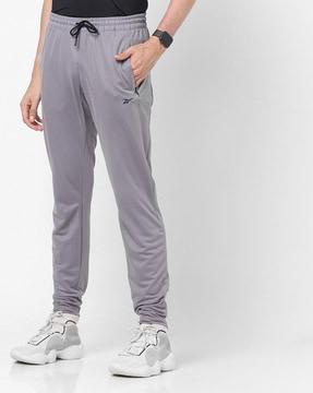 mid-rise tensile pants with drawstring waistband