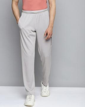 mid-rise track pants with flap-pocket
