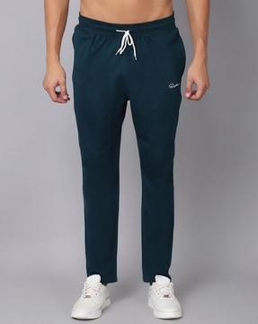 mid-rise trousers with elasticated waist