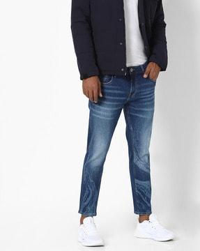 mid-rise washed ankle-length slim fit jeans