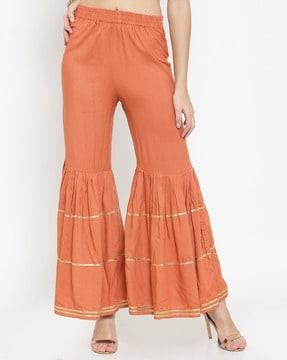 mid-rise ankle length flared palazzos