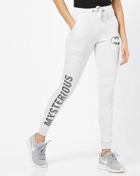 mid-rise batman joggers with typographic print