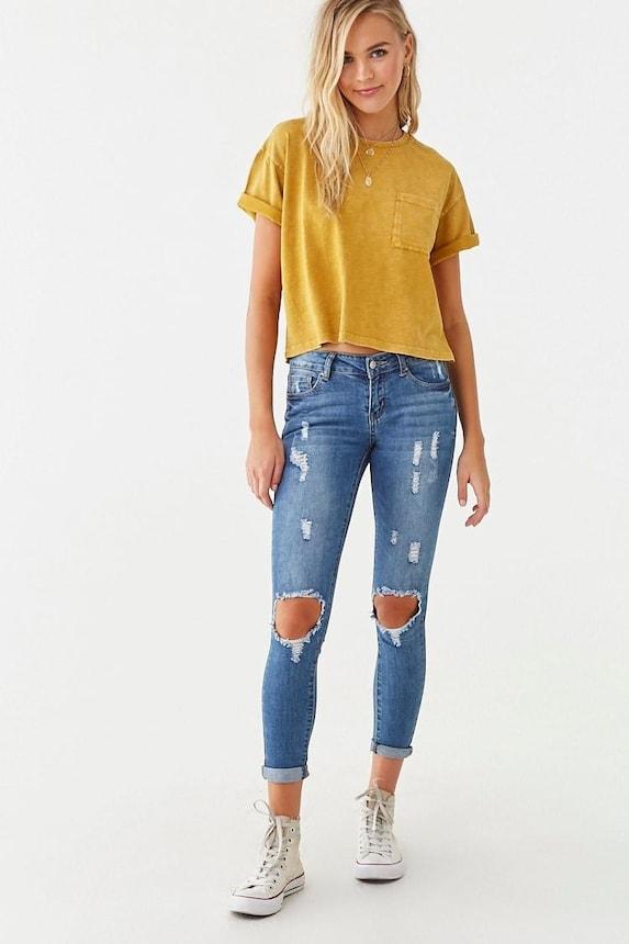 mid-rise distressed skinny jeans