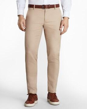 mid-rise extra slim fit pleated pants