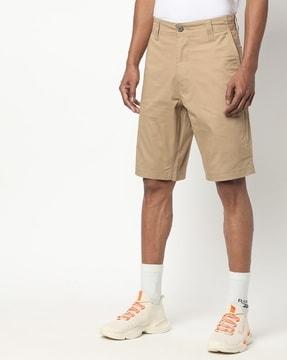 mid-rise flat-front shorts