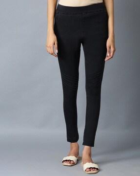mid-rise leggings with patch pockets