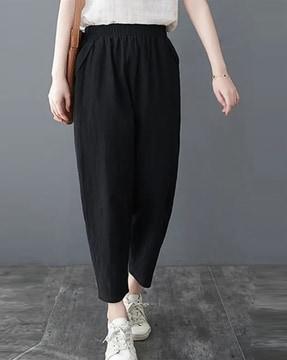 mid-rise loose fit trousers with elasticated waist