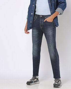 mid-rise mid-wash j24 tapered jeans