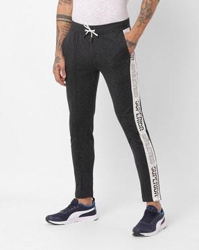 mid-rise panelled slim fit track pants with elasticated drawstring waist