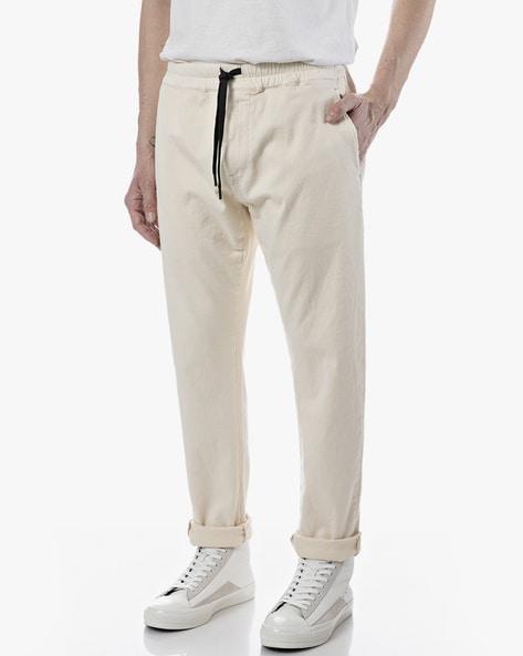mid-rise pants with drawstring waist