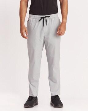 mid-rise pants with elasticated waistband