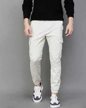 mid-rise pants with insert pockets