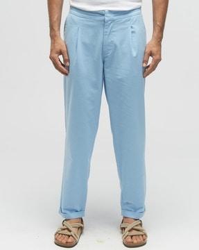 mid-rise pleated pants with insert pockets