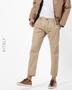mid-rise pleated trousers with insert pockets