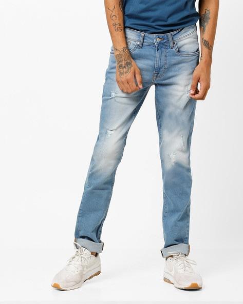 mid-rise skinny fit light distress washed jeans