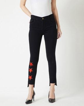 mid-rise skinny jeans with cut hems