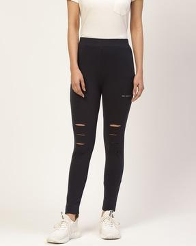 mid-rise skinny jeggings with knee-slit