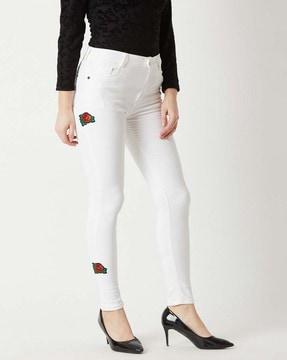 mid-rise slim fit jeans with applique