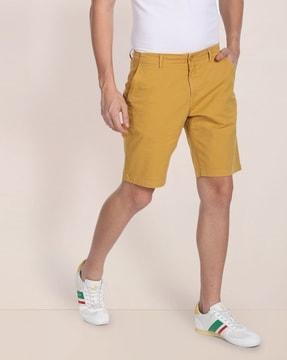 mid-rise slim fit shorts