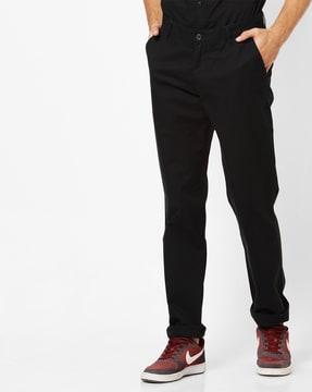 mid-rise slim fit trousers with insert pockets